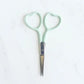 Embroidery scissors in multiple colors with heart shaped finger holes