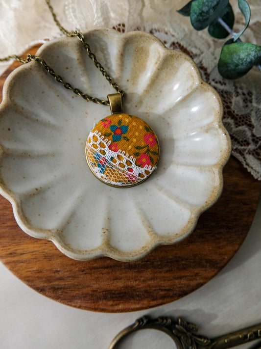 Fabric and Lace Pendant Necklace in Bronze