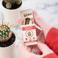 Mini cross stitch kit in a matchbox in the design of a cactus plant